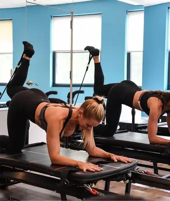person doing studio slt pilates class