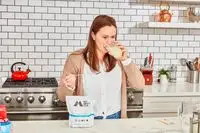 Person drinking Momentous Collagen Peptides