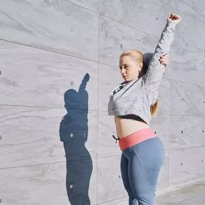 person stretching outside