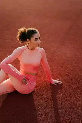 person stretching in the sun