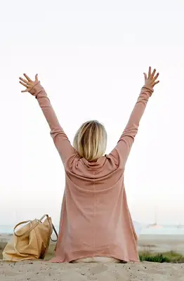 person stretching by the bay