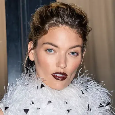 Martha Hunt with burgundy lipstick