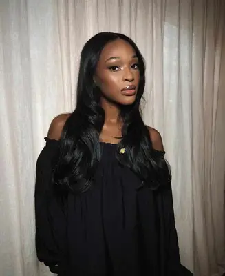 model wears natural glam nude makeup look