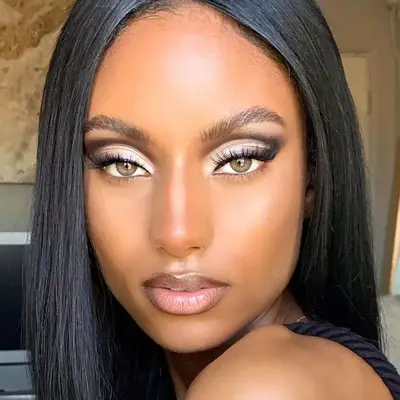 Sydney Harper in contrasting white, gray, and black shadows