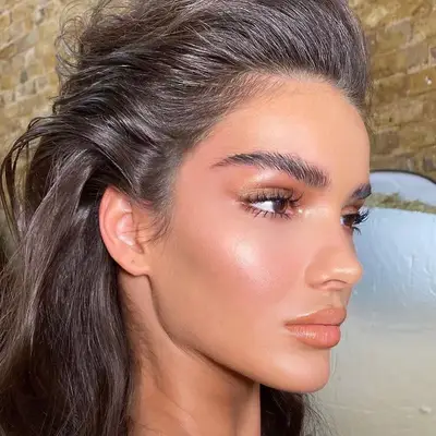 Arbenita Ismajli in gleaming gold makeup