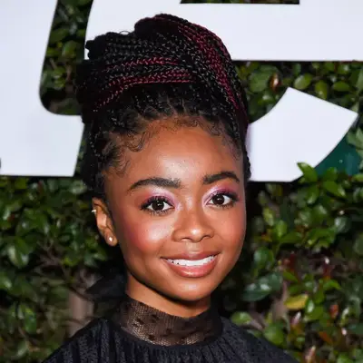 Skai Jackson with a braided bun and pink eyeshadow at Teen Vogue