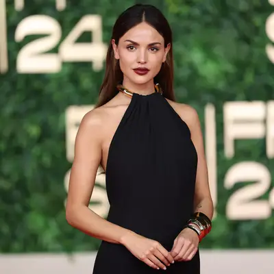 Eiza Gonzalez with a dark cherry red lip and a black dress at the 2024 Red Sea International Film Festival in Jeddah, Saudi Arabia