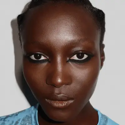 model wearing black eyeliner