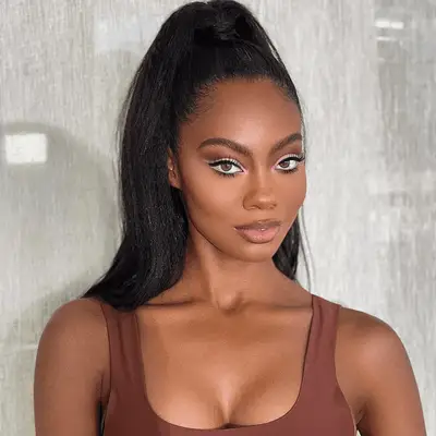 woman wearing pink eyeliner