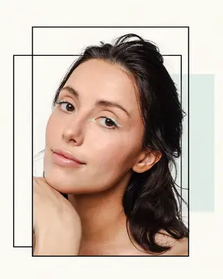 Portrait of a Woman Wearing Mint Green Graphic Winged Eyeliner 