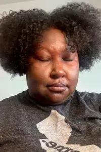 A person before applying Honest Beauty Extreme Length Mascara + Lash Primer