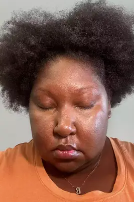 A person before applying Tarte Opening Act Lash Primer