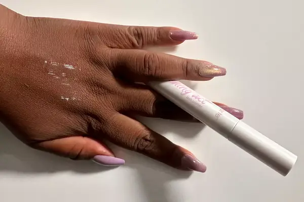 Tarte Opening Act Lash Primer applied to the back of a person