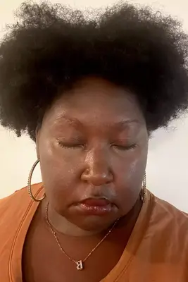 A person after applying Tarte Opening Act Lash Primer