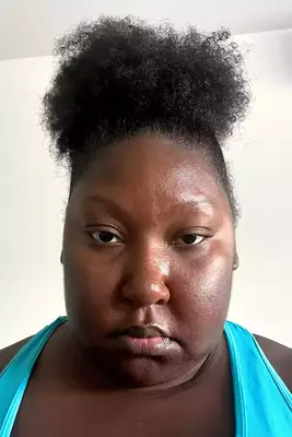 A person after applying Too Faced Better Than Sex Foreplay Mascara Primer