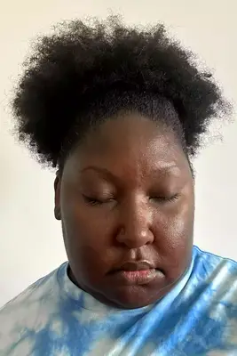 A person after applying Dior Diorshow Maximizer 3D Triple Volume Plumping Lash Primer