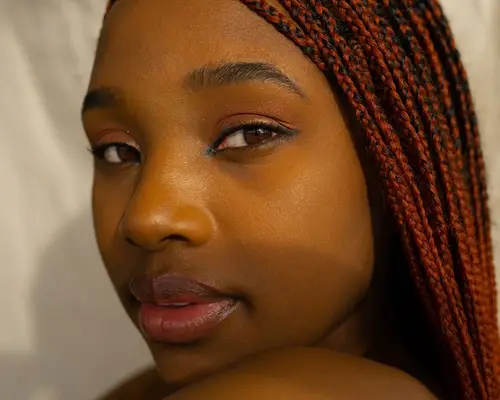 Close up of a woman wearing subtle eyeliner and mascara