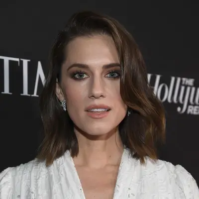 Allison Williams with smoky brown eyeshadow and dewy skin