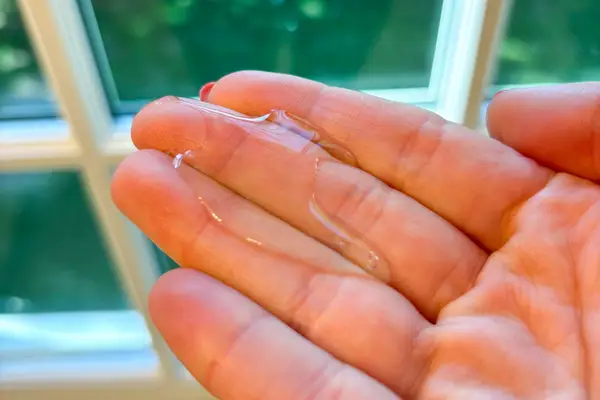 Blue and gold Dyson Supersonic Hair Dryer with attachments shown