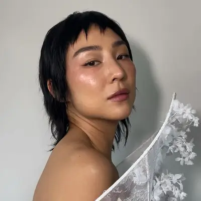 dewy wedding makeup with mauve lipstick and blush