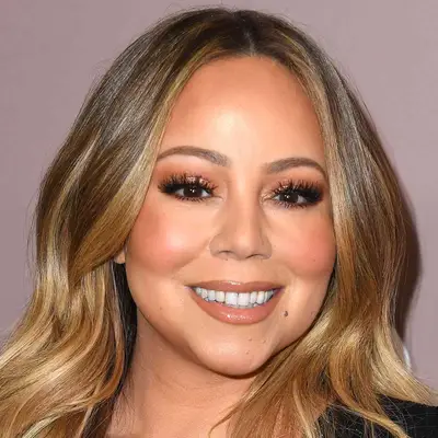 Mariah Carey soft rose gold glam eyeshadow with eyelashes.