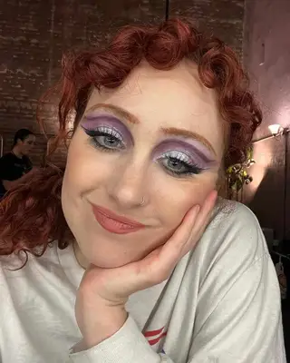 Chappell Roan wearing a purple eyeshadow look. 