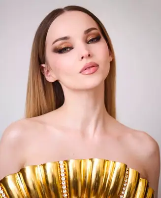 Dove Cameron wears gilded gold eyeshadow
