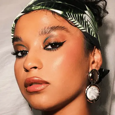 Vanessa Hudgens in bright yellow eyeshadow.