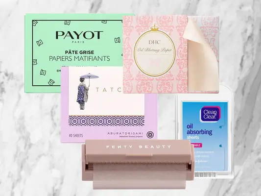 Collage of blotting papers, including Payot, DHC, Tatcha, Clean & Clear, and Fenty Beauty, on a marble background