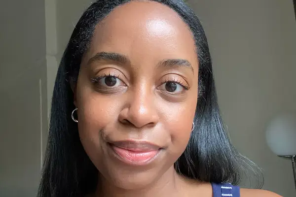 A MYM Beauty editor wearing a full-face sunscreen makeup look
