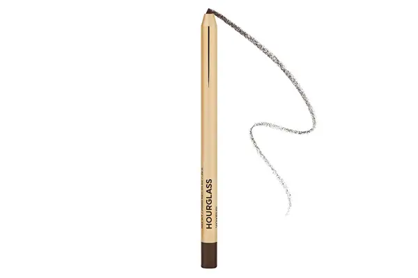 A close-up of a person applying MAC Colour Excess Gel Pencil Eye Liner to their eye