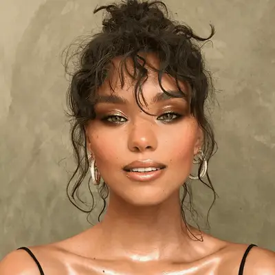 Model wears variations of copper shadow on the lid and crease paired with matte nude lipstick 