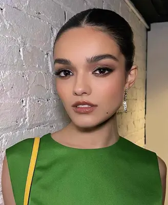 Close up of a model with natural-looking, glossy makeup