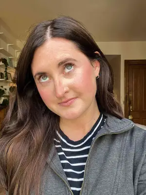 A person after applying the Tower28 MakeWaves Lengthening + Volumizing Mascara