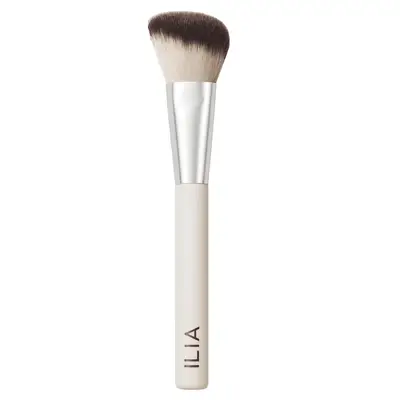 Slanted blush brush with a white handle