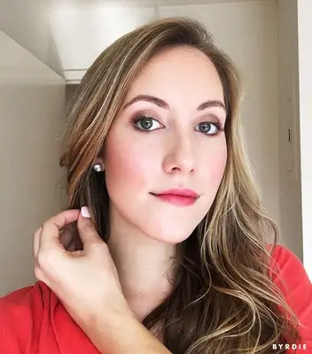 Former MYM Beauty editor Lindsey Metrus wearing DIY lash extensions and a radiant makeup look