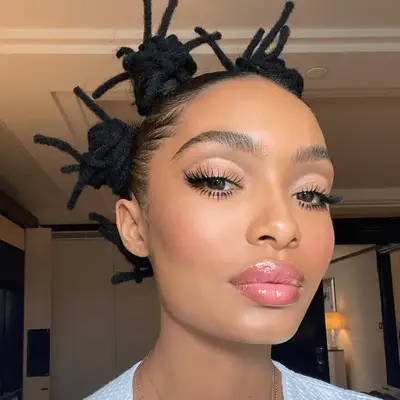 Yara Shahidi with natural toned eyeshadow and bantu knots