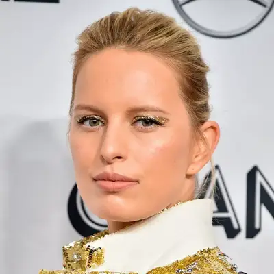 Karolina Kurkova wears a gold glitter eye makeup look