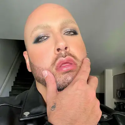 A grunge glam eye makeup with black and silver.