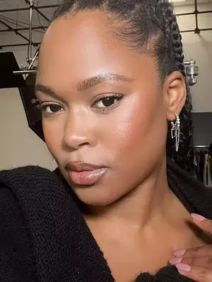 woman with rosy sculpted cheeks