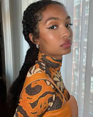Forest green and yellow eyeliner on actress yara shahidi
