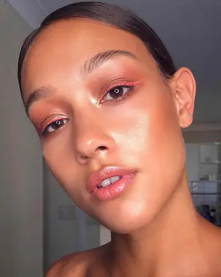 Neon orange cat eye on model