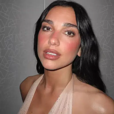 Dua Lipa wearing shimmery eyeshadow