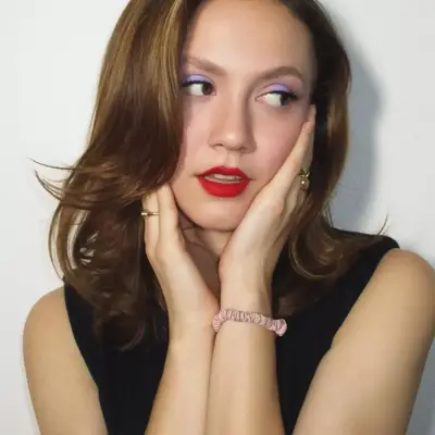 Iris Law wearing purple eyeshadow