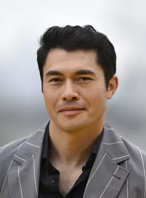 Henry Golding attends the 