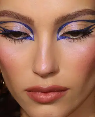 moderl wears electric blue metallic graphic liner