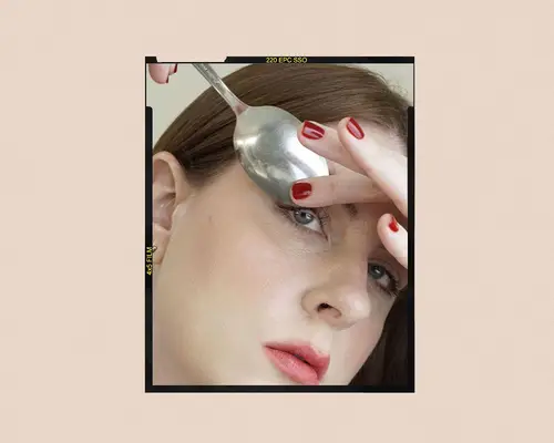 step two of curling lashes with a spoon