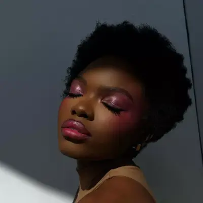 Pink frosted eyeshadow with a juicy pink lip.