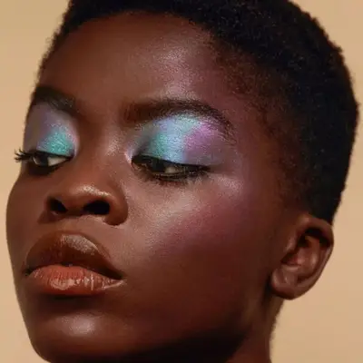 A frosted eye with shades of blue and purple.