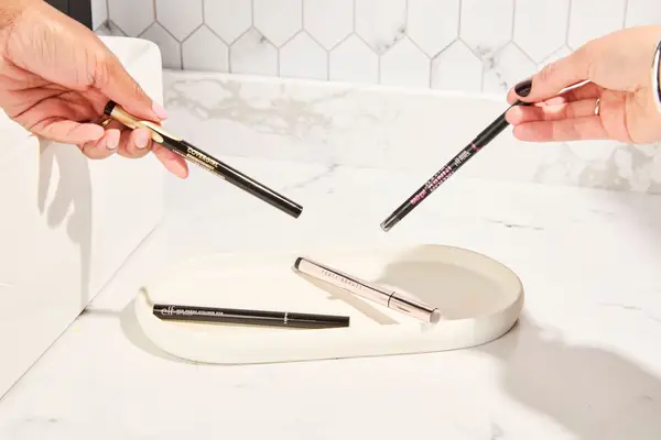 a collection of the best waterproof eyeliners on a tray